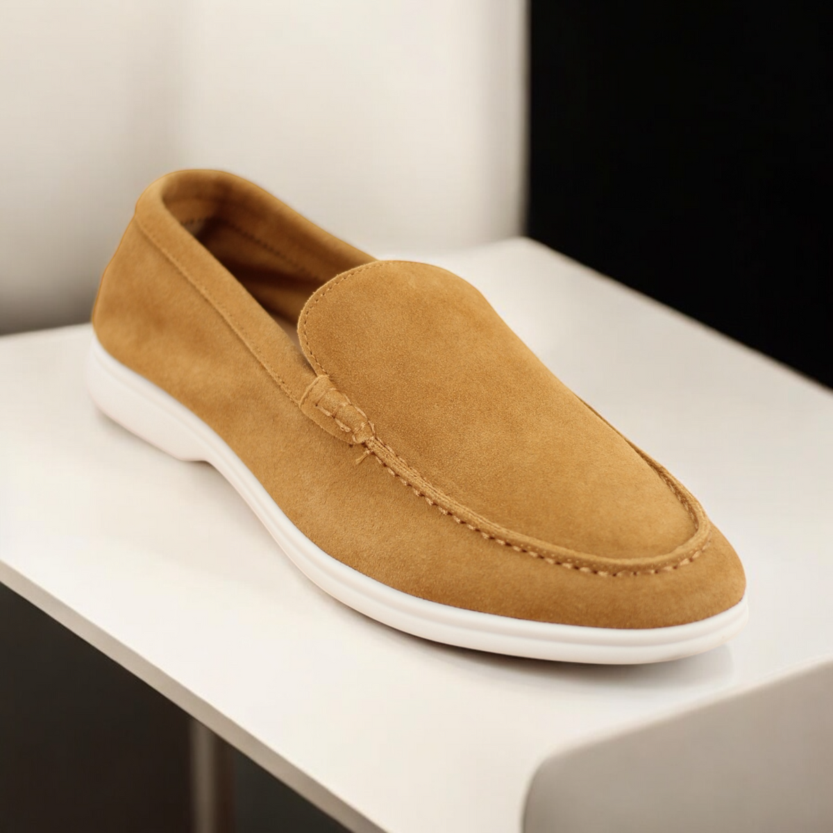Men Shoes in light brown, a slip-on shape with a white sole and visible stitching at the toe