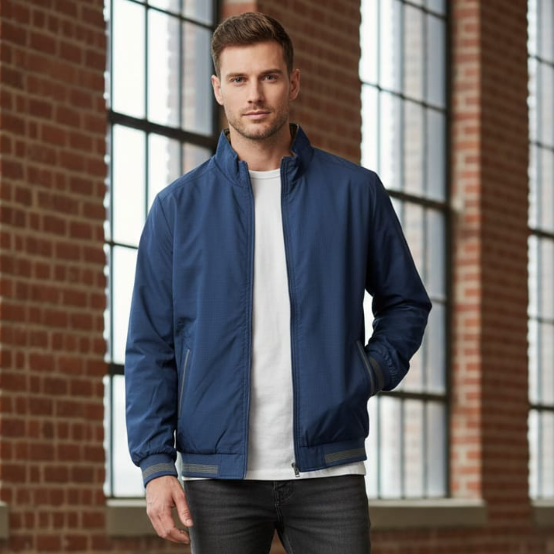 Navy bomber jacket with a stand collar, a full zip, ribbed cuffs and a ribbed hem