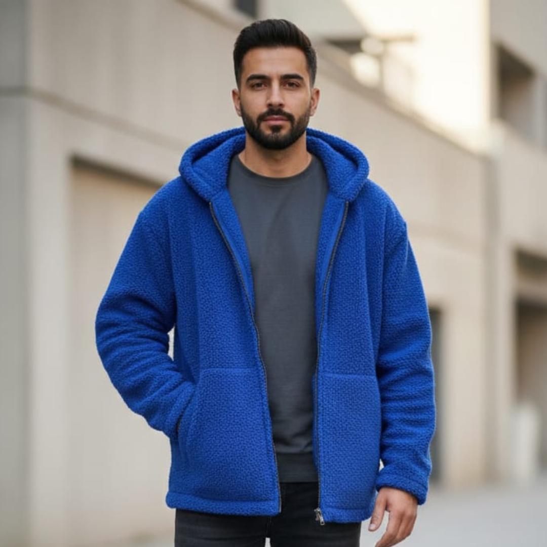 Blue hooded jacket with a soft textured face, a full zip and two side pockets