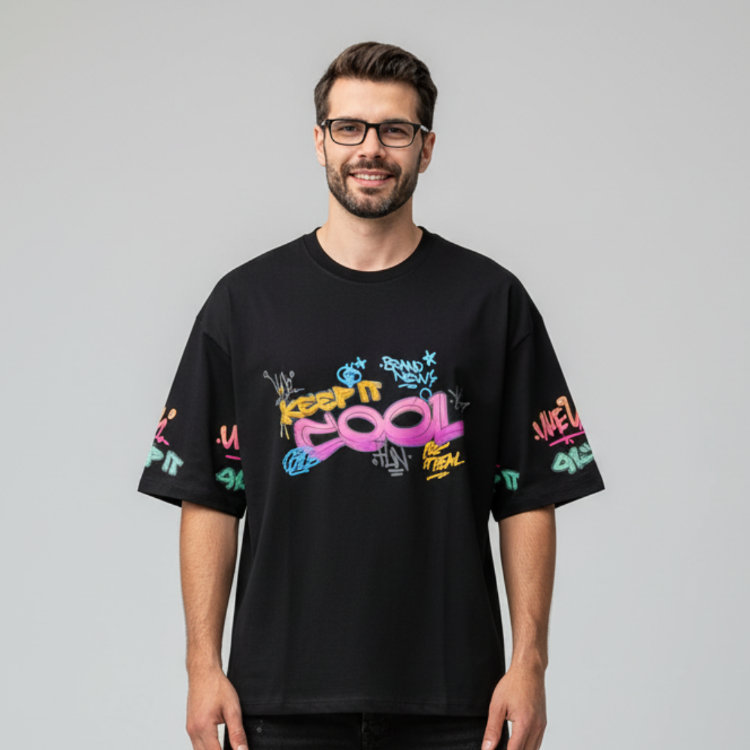 Men t-shirt in black with a colourful graffiti print at the chest and prints on both sleeves