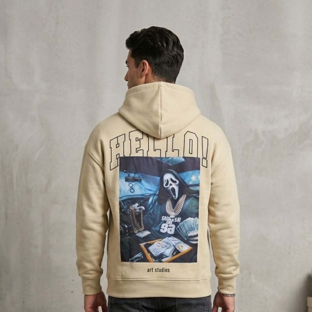 Cream hoodie with outline arched lettering above a framed print across the back