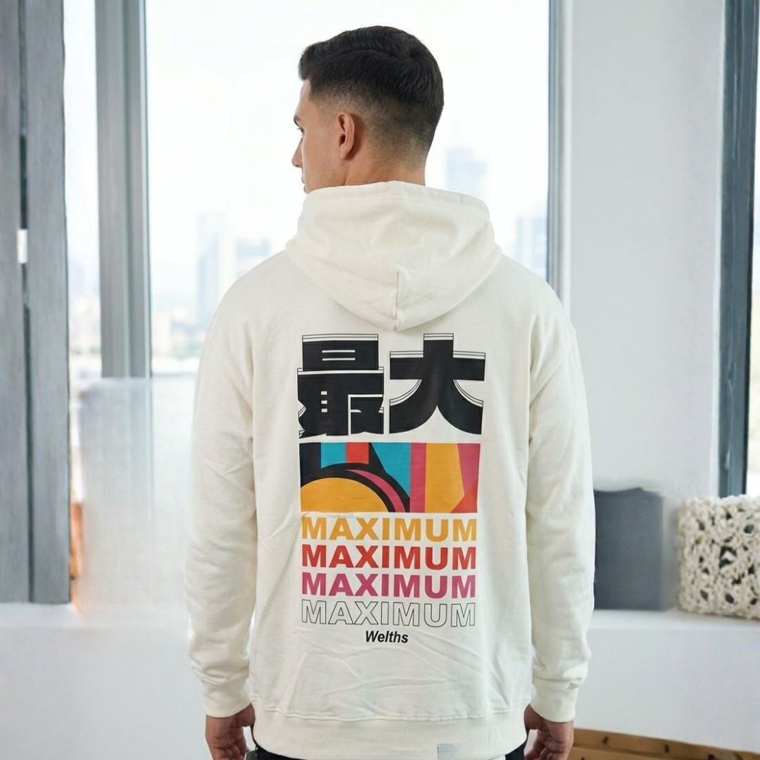 Cream light hoodie from the back with a bold colourful block print and repeated text lines