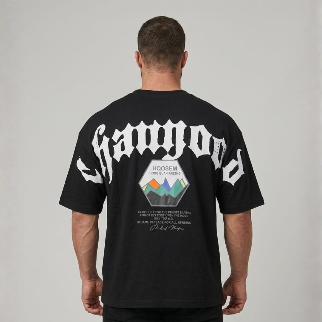 Oversized T-Shirt in black with a colour hexagon panel on the back, back view