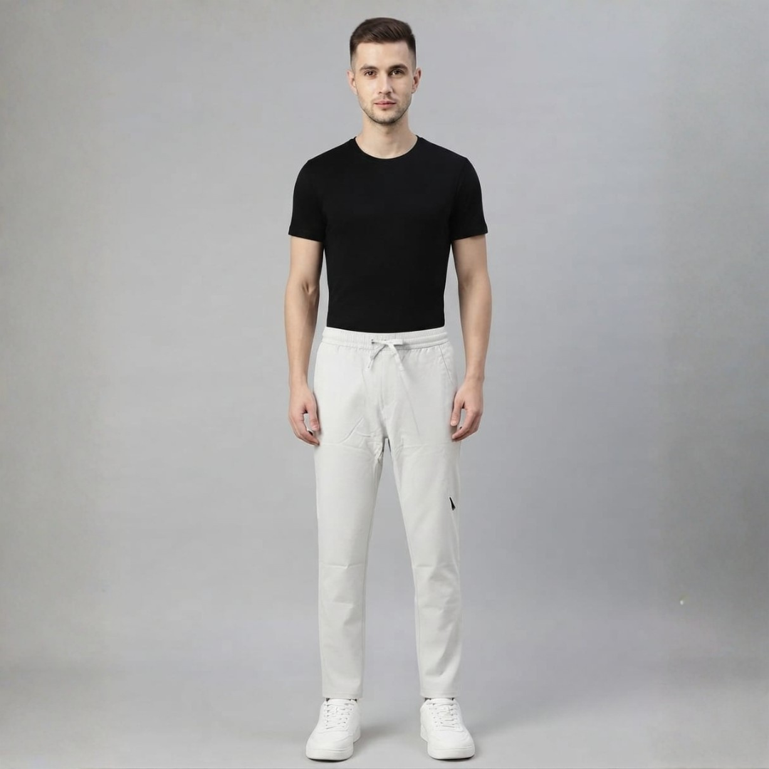 Light grey jumbo pants with a wide straight leg and a drawstring waist