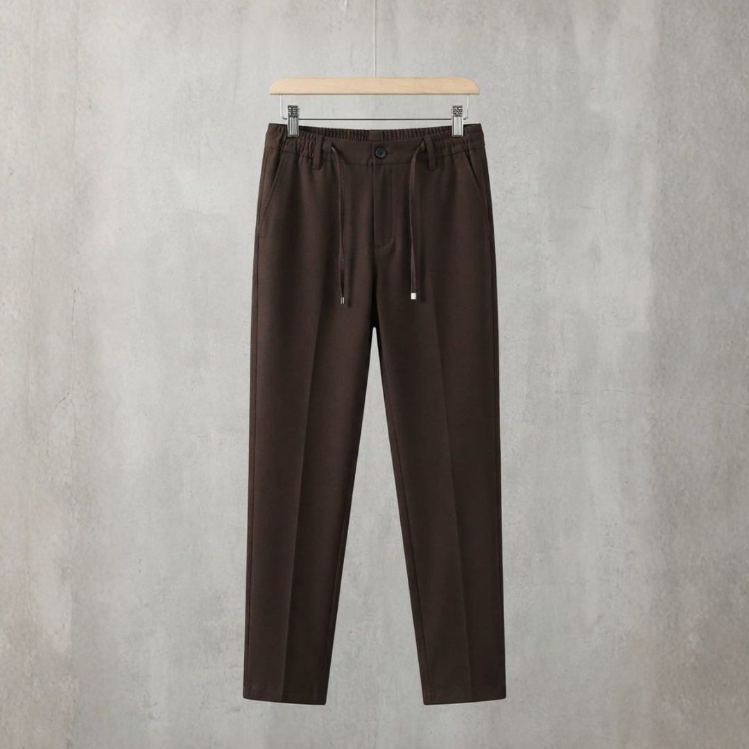 Dark brown classic pants with an elastic drawstring waist and a front crease