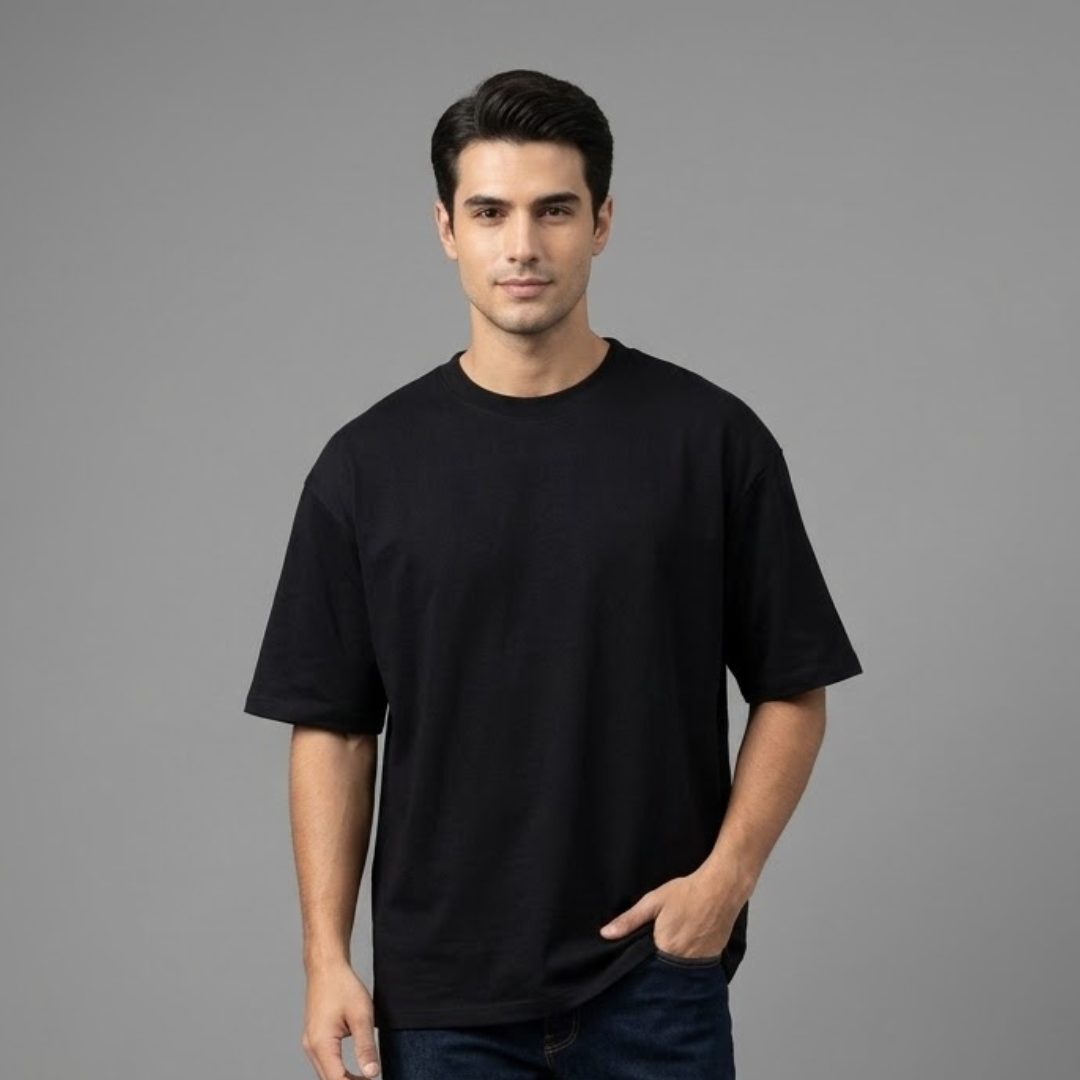 Black T-shirt, Big Size, plain with dropped shoulders and a round neck, worn by a person