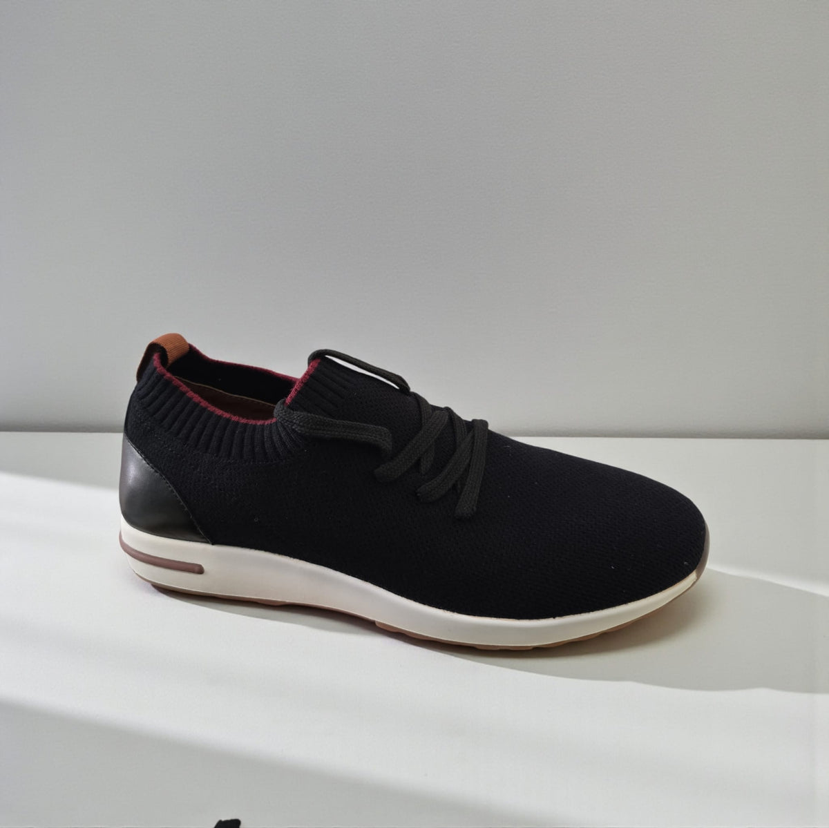 Men Shoes in black with a knitted upper, dark laces, a ribbed collar and a white midsole