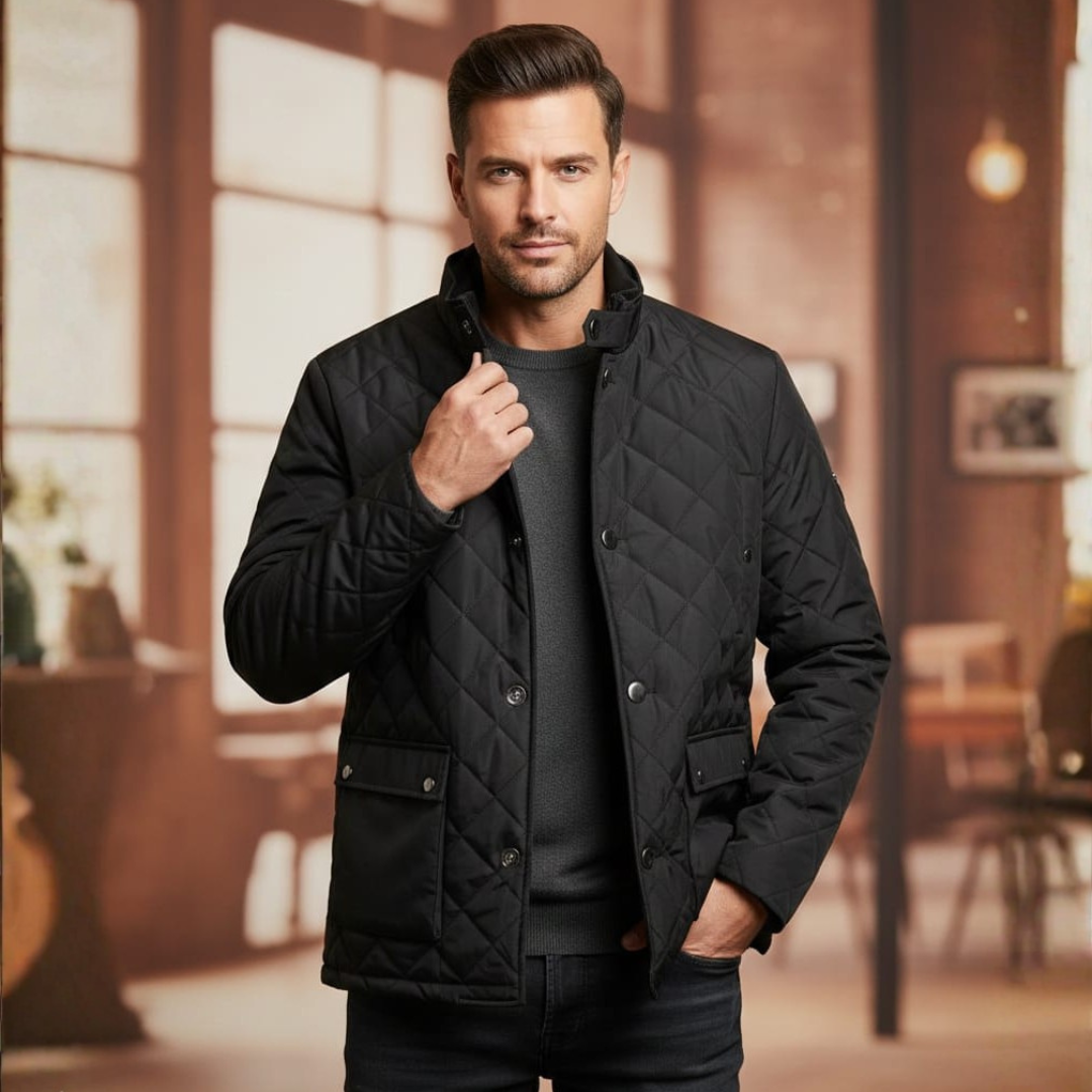 Black diamond quilted jacket with a button front and flap pockets at the waist