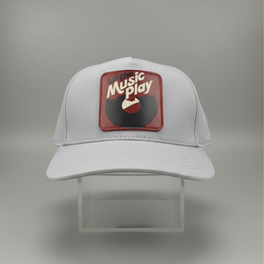 Light grey cap with a dark red patch of a vinyl record at the front
