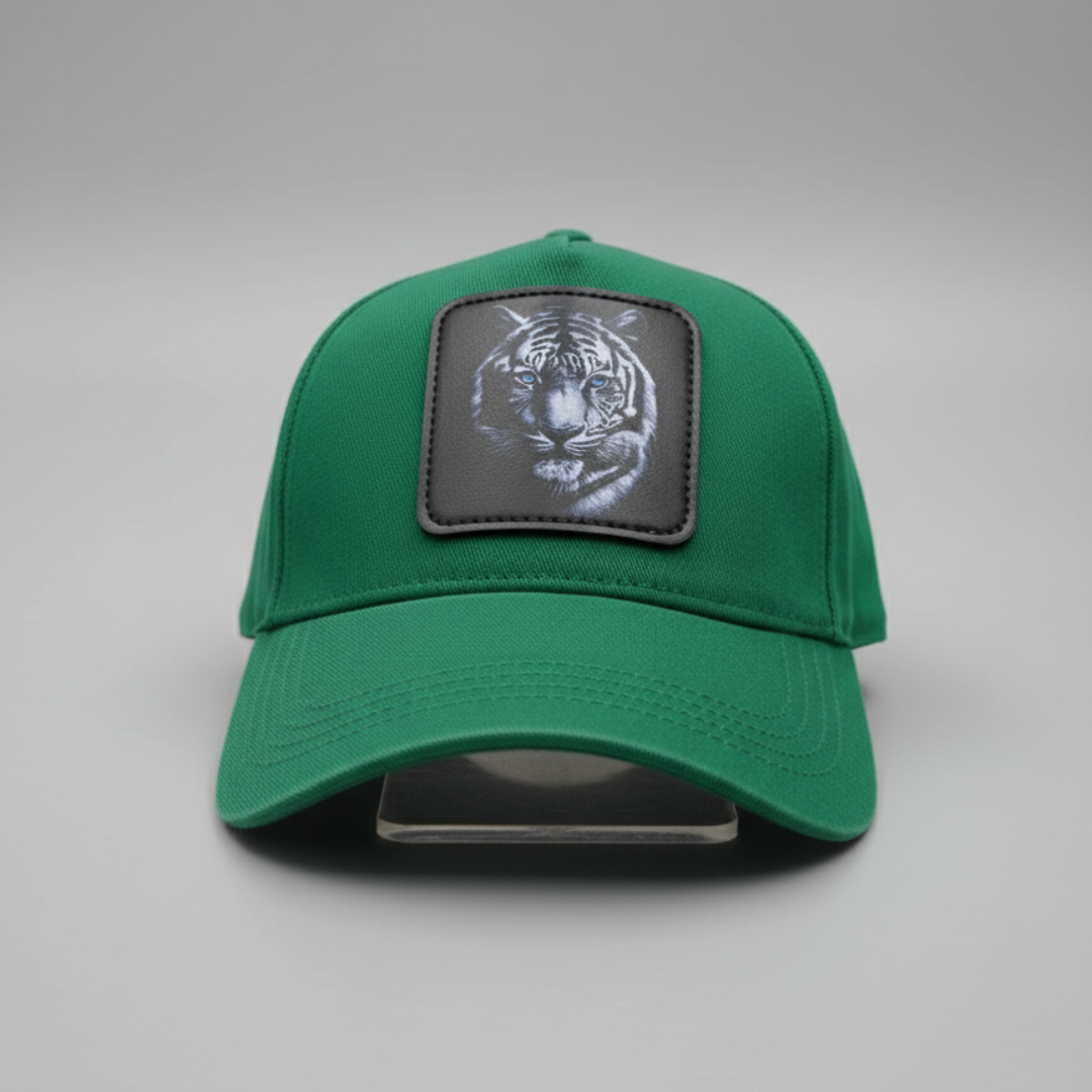 Green cap with a grey square patch of a white tiger face