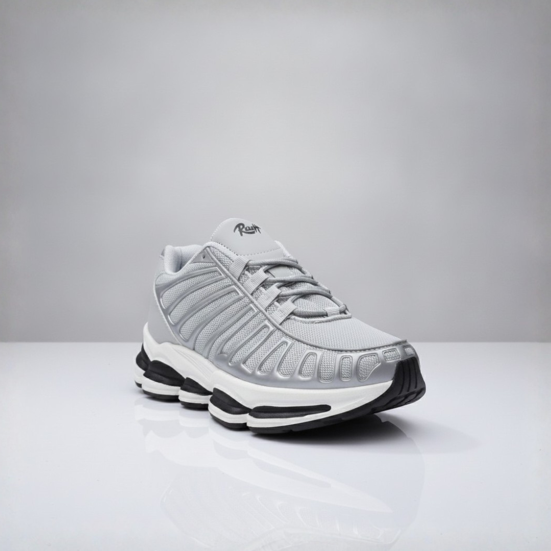 Men shoes in grey with raised side detail and a white sole