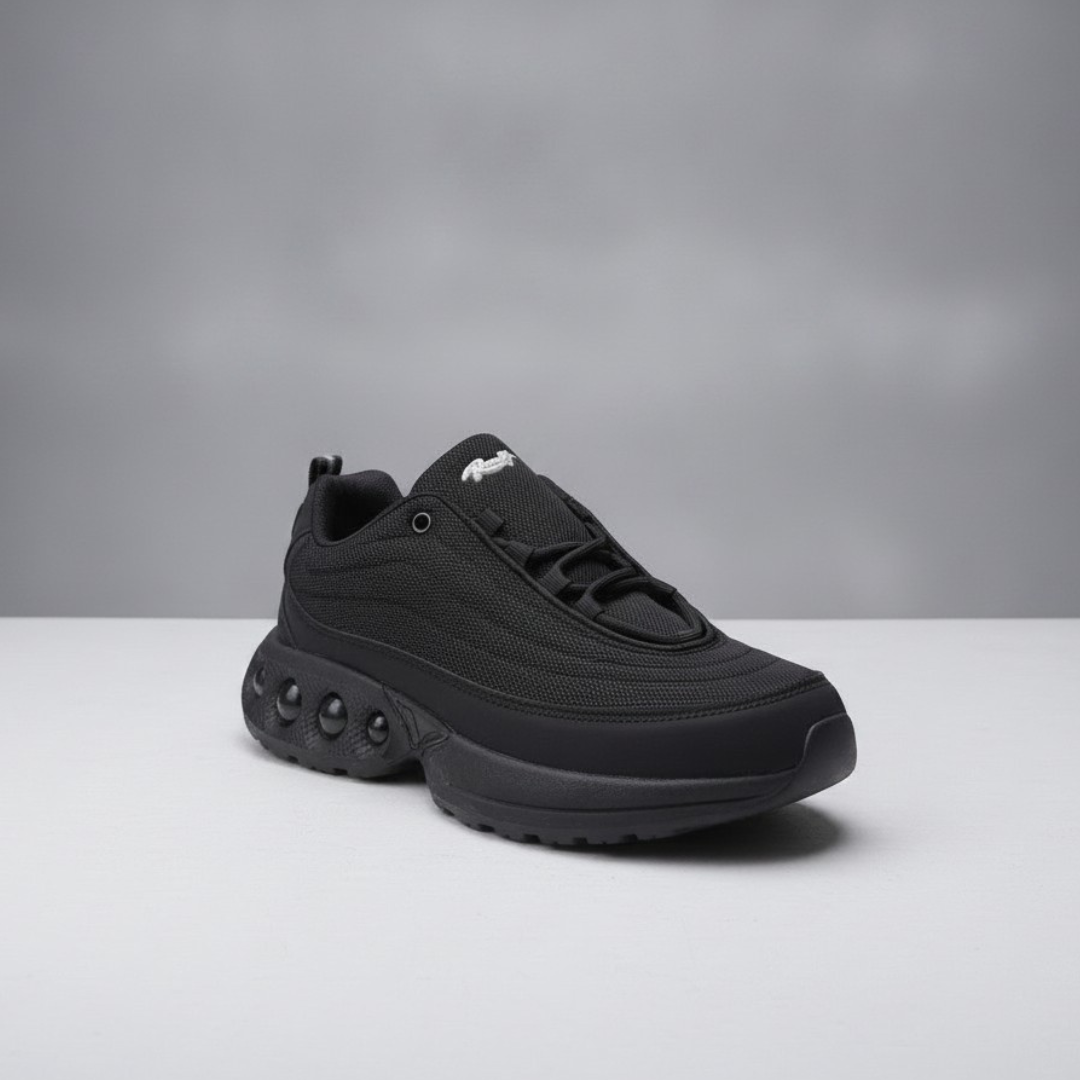 Men shoes in black with a knit upper and a bubble sole