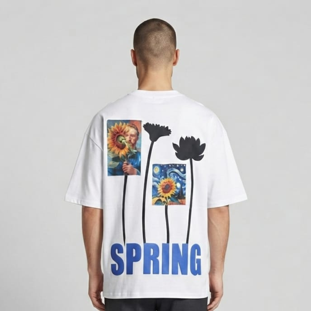 White tee from the back with two floral art panels, four long stemmed flowers and a large word below