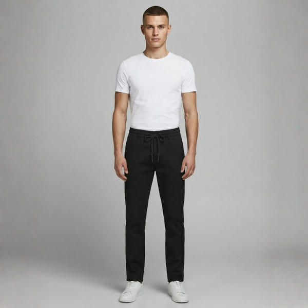 Black casual pants with an elastic waist and a tied drawstring